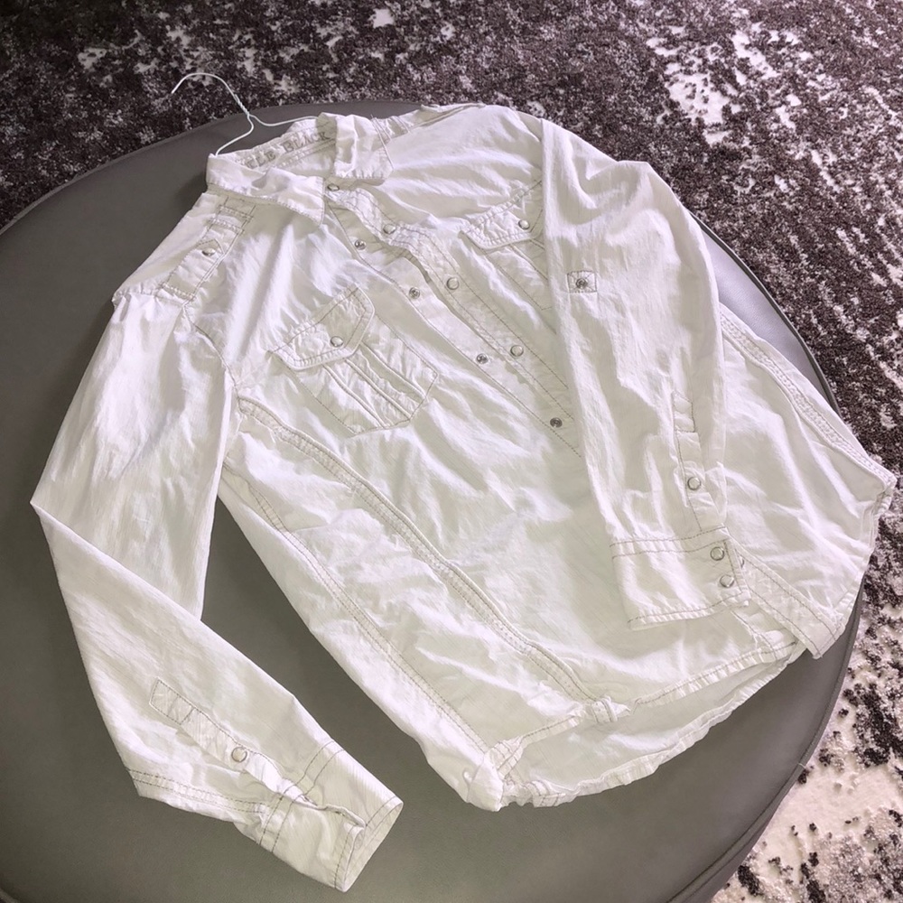 Button down collared shirt.